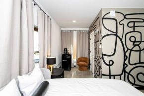 Steps to Bathhouses, Restaurants, Heart of Downtown, Room # 301